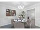Elegant dining room with views to the living room and featuring modern decor at 4353 Pond Edge Rd, Snellville, GA 30039