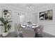 Charming dining room with stylish decor and easy access to other living spaces at 4353 Pond Edge Rd, Snellville, GA 30039