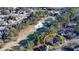Scenic aerial view of a home situated on a golf course with lush green surroundings and mature trees at 5702 Brynwood Nw Cir, Acworth, GA 30101
