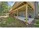 A spacious, covered patio underneath a backyard deck enhances this home, complete with an access door at 5702 Brynwood Nw Cir, Acworth, GA 30101