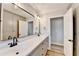Bathroom with double sink vanity, large mirror, and cabinet space at 5702 Brynwood Nw Cir, Acworth, GA 30101