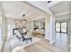 Open concept dining room and living room featuring an abundance of natural light at 5702 Brynwood Nw Cir, Acworth, GA 30101