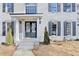 Charming front entrance with double doors and freshly manicured landscaping at 5702 Brynwood Nw Cir, Acworth, GA 30101