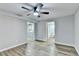 Living room views into the modern kitchen and bathroom at 5702 Brynwood Nw Cir, Acworth, GA 30101