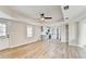 Open-concept living area with new flooring, kitchen, and lots of light at 5702 Brynwood Nw Cir, Acworth, GA 30101