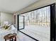 Bright patio with sliding glass doors featuring natural outdoor views at 5702 Brynwood Nw Cir, Acworth, GA 30101