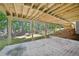 View under the deck shows the foundation, supports, and a level patio at 5702 Brynwood Nw Cir, Acworth, GA 30101