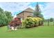 A well-maintained backyard offers a private retreat with a pool and green space at 7045 Parrish Way, Cumming, GA 30040