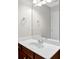 Bathroom with a single vanity and a mirror at 735 Scenic Creek Dr, Lawrenceville, GA 30046