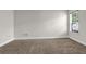 Neutral bedroom with carpet and a window bringing in light at 735 Scenic Creek Dr, Lawrenceville, GA 30046