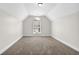 Empty bedroom with neutral carpet and window for natural light at 735 Scenic Creek Dr, Lawrenceville, GA 30046