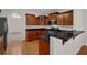 Well-appointed kitchen with granite countertops and wood cabinets at 735 Scenic Creek Dr, Lawrenceville, GA 30046