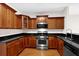 Kitchen featuring stainless steel appliances and granite countertops at 735 Scenic Creek Dr, Lawrenceville, GA 30046