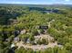 Aerial view showcasing the community's lush surroundings and convenient access to Downtown Atlanta at 1106 Rock Creek Ln, Norcross, GA 30093