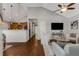 Cozy dining area with modern lighting, a table for six, and an open layout leading to the kitchen at 1596 Foote Ne St, Atlanta, GA 30307