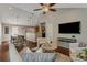 Spacious living room with hardwood floors, contemporary furnishings, and a seamless flow to the dining area at 1596 Foote Ne St, Atlanta, GA 30307