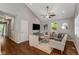 Open living area features vaulted ceilings, recessed lighting, hardwood floors, and a view of the outdoor scenery at 1596 Foote Ne St, Atlanta, GA 30307