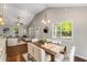 Bright open concept home with high ceilings featuring dining area and living room with many large windows at 1596 Foote Ne St, Atlanta, GA 30307