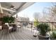 Outdoor balcony with furniture and potted plants offering a relaxing space for outdoor living at 2119 Dee Dee Muse Nw Ln, Atlanta, GA 30318