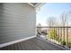 Enjoy outdoor living on this charming balcony with decorative iron railings and views at 2119 Dee Dee Muse Nw Ln, Atlanta, GA 30318