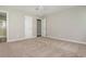 Bright bedroom with carpet flooring and neutral paint, providing a peaceful retreat at 4855 Brownsville Rd, Powder Springs, GA 30127