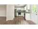 Bright kitchen with stainless steel appliances, granite countertops, and stylish backsplash at 4855 Brownsville Rd, Powder Springs, GA 30127