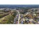 An aerial view of the neighborhood reveals lush greenery and well-maintained homes at 570 Highcrest Dr, Acworth, GA 30101
