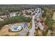The aerial view highlights community amenities including a pool, playground, and sport court at 570 Highcrest Dr, Acworth, GA 30101