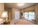 Serene bedroom with a window seat and soft, natural lighting at 570 Highcrest Dr, Acworth, GA 30101