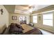 Bright bedroom with tray ceiling and entry to living room at 570 Highcrest Dr, Acworth, GA 30101