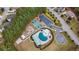 An aerial view highlights the community pool, playground, and recreational facilities at 570 Highcrest Dr, Acworth, GA 30101