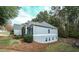 Exterior shot of home and yard with mature landscaping at 570 Highcrest Dr, Acworth, GA 30101