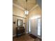 Inviting foyer with hardwood floors, decorative lighting, and a charming antique desk at 570 Highcrest Dr, Acworth, GA 30101