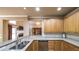 Spacious kitchen with granite countertops and open layout to the Gathering room at 570 Highcrest Dr, Acworth, GA 30101
