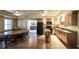 Spacious open kitchen and dining area boast modern appliances and plenty of counter space at 570 Highcrest Dr, Acworth, GA 30101