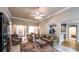 Bright living room with high ceilings, open to the dining room and kitchen at 570 Highcrest Dr, Acworth, GA 30101