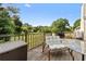 Back deck with a patio chair, outdoor furniture and a beautiful view at 129 Lakepointe Ct, Stockbridge, GA 30281