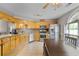 Spacious kitchen with stainless steel appliances, wooden cabinets, and a tile backsplash at 129 Lakepointe Ct, Stockbridge, GA 30281