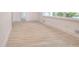 Spacious living room with light wood flooring, fresh paint, and modern lighting at 2094 Shamrock Dr, Decatur, GA 30032