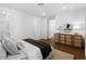 Bright bedroom with a dresser, soft lighting, and a comfortable atmosphere at 308 Chardonnay Way, Woodstock, GA 30188