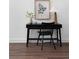 Office featuring a black desk, chair, wood floors, and modern decor at 308 Chardonnay Way, Woodstock, GA 30188