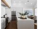 Modern kitchen with a large island, stainless steel appliances, and ample cabinet space at 308 Chardonnay Way, Woodstock, GA 30188