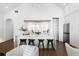 Modern kitchen with sleek countertops, a breakfast bar, and stainless steel appliances at 308 Chardonnay Way, Woodstock, GA 30188