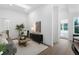 Comfortable living room showcasing a modern design, neutral decor, and ample natural light at 308 Chardonnay Way, Woodstock, GA 30188
