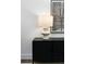Living room features a side table, modern lamp, and stylish decor at 308 Chardonnay Way, Woodstock, GA 30188