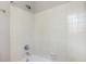 Cozy bathroom with a shower and a tub, featuring white square tiles at 3761 Bays Ferry Way, Marietta, GA 30062