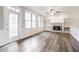 Spacious living room has fireplace and beautiful natural light at 3761 Bays Ferry Way, Marietta, GA 30062