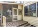 Back porch entry with wood decking and white railing and lattice at 3761 Bays Ferry Way, Marietta, GA 30062