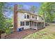 Exterior view of the rear of the home and its yard and patio at 3761 Bays Ferry Way, Marietta, GA 30062