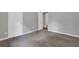 A large bedroom with plush carpeting and convenient double doors for easy access at 3929 Emerald Springs Ct, Decatur, GA 30035
